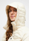 podgląd Kurtka damska Peak Performance Helium Hybrid Down Hood Jkt W Sand Fog N36